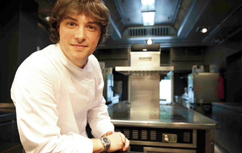 Jordi Cruz (5 Michelin stars) stands in the kitchen