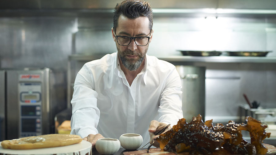 Quique Dacosta (5 Michelin stars) prepares a dish in his kitchen